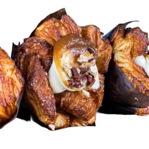 delicious apple pecan monkey danishes, featuring flaky pastry, a creamy filling, caramelized apples, pecans, and a dusting of cinnamon sugar.