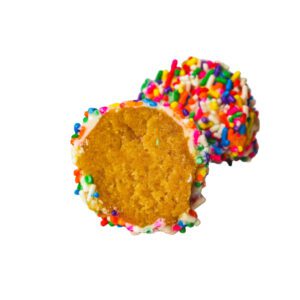 Vanilla cake and frosting, rolled in white chocolate and rainbow sprinkles