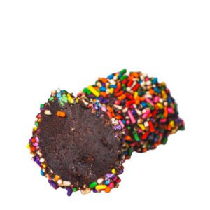 Chocolate cake and chocolate frosting, coated in dark chocolate and rainbow sprinkles