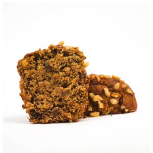 Vegan Banana Walnut Muffin: A moist and flavorful banana muffin, studded with walnuts and finished with a sprinkle of toasted walnuts on top.
